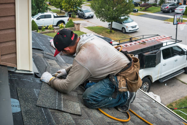 Professional Emergency Roof Repair technician working in Adams, OR